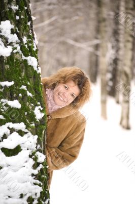 Portrait woman in the park closeup