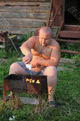 The man makes fire
