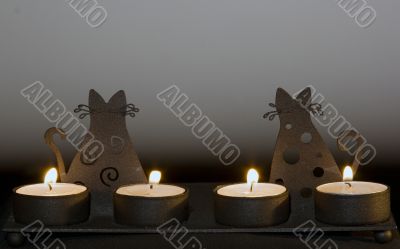 candlestick with cats