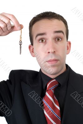 Businessman Holding Key