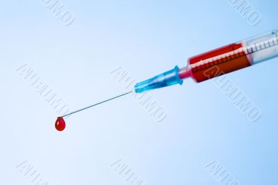 syringe with blood