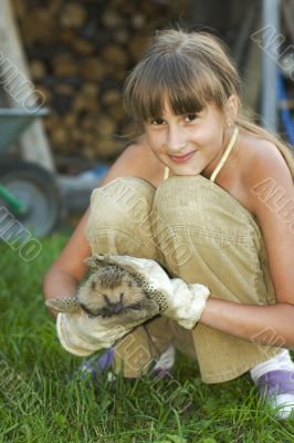 girl with hedgehog