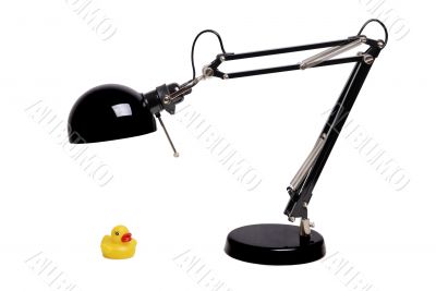Black lamp. Yellow duck