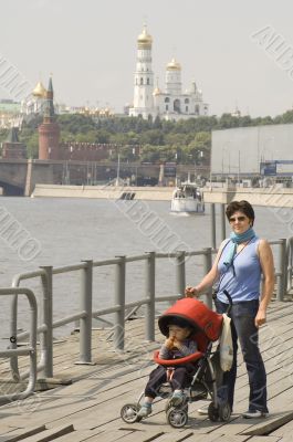 mother and baby on river
