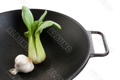Bok Choy and Garlic in a Wok