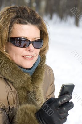woman with mobile phone close up