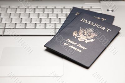 Passports on Laptop Keyboard