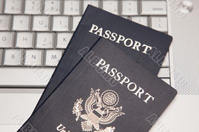 Passports on Laptop Keyboard