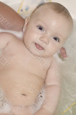 baby in bath close up