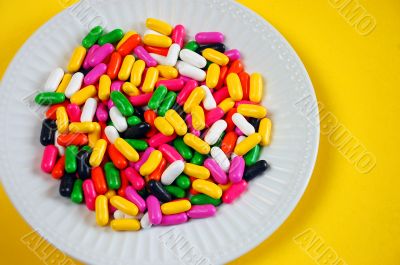 Colorful candy on plate