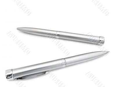 ballpoint pens in the box over the white background