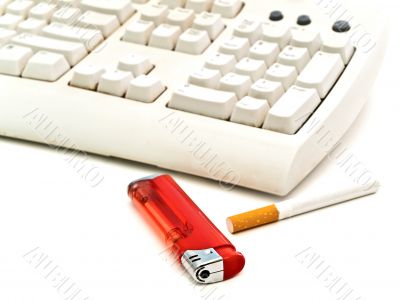 keyboard, cigarette and  lighter