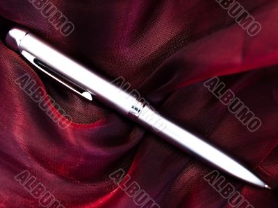 silver pen at fabric