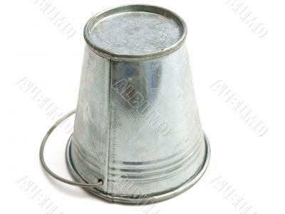 metallic bucket against the white
