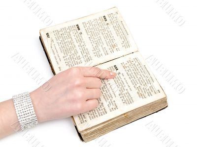 woman reading old book