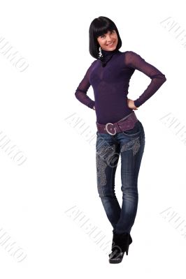 Smiling young woman in jeans