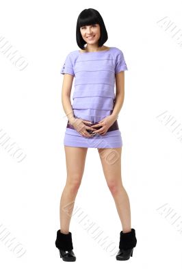 Smiling young woman in little dress