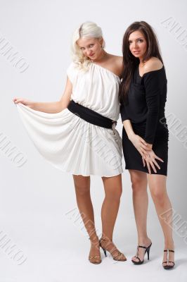 women in black and white dresses
