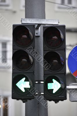 traffic lights with green arrow