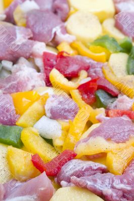 Crude meat and vegetables sliced