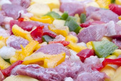 Crude meat and vegetables sliced