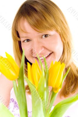 woman with yellow tulips