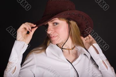 woman in a brown hat