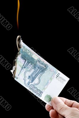 burning paper currency