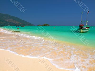 Boat on a tropical beach