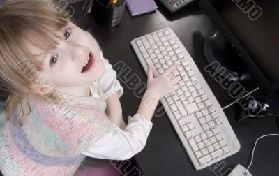 little girl and computer