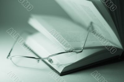 book and glasses