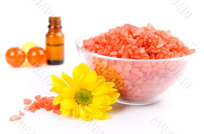 bath salt, oil balls in a bowl and flower
