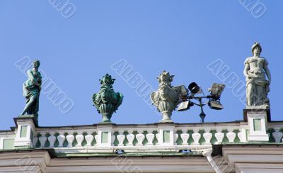 Metal women over a city