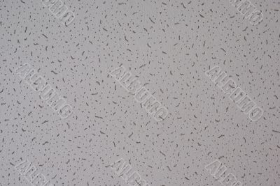 Grey rugged background with spots and stripes