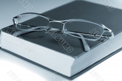 book and glasses