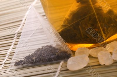 white tea, nylon tea-bag and sugar