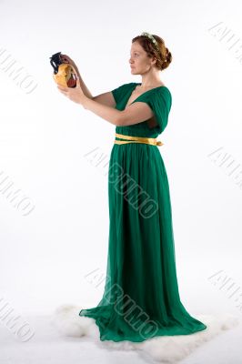 Lady in green handing jug