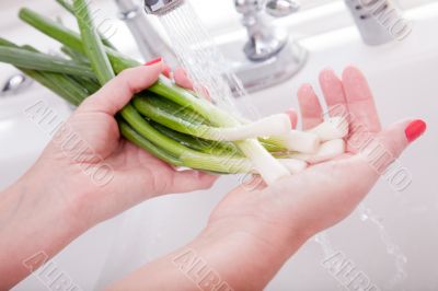 Woman Washing Onions
