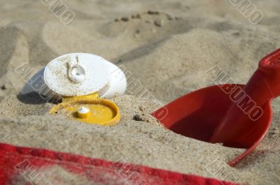 childhood. beach items and sun block