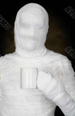 Man in bandage with mug