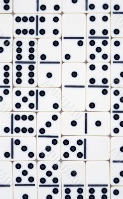 Background from white dominoes pieces