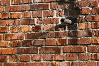 Pipe in a wall