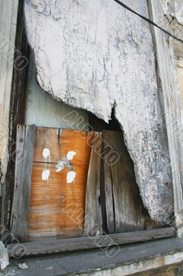 Old boarded up window