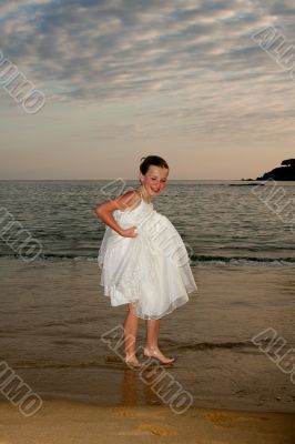 Flower girl in the sand