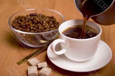 cup of coffee, sugar and beans