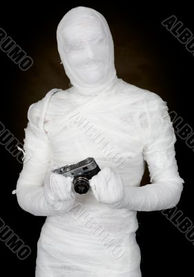 Mummy with retro camera