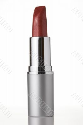 red lipstick on white background