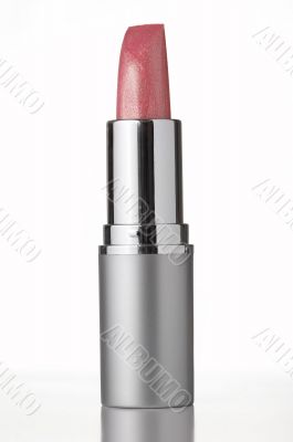 pink lipstick on white background