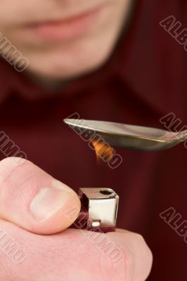 Tea-spoon and lighter