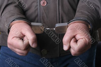 hands with handcuffs